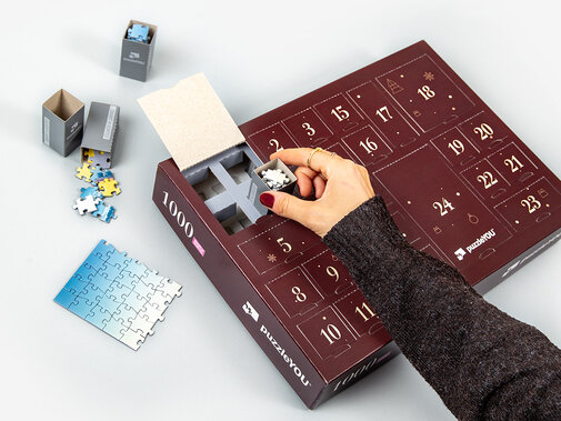 Puzzle-Calendario dell'Avvento „Tutti i cani amano il Natale“
